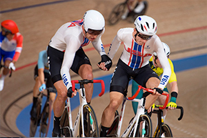 Adrian Hegyvary & Gavin Hoover exchange in the Men's Madison in Tokyo. Photo: Casey Gibson